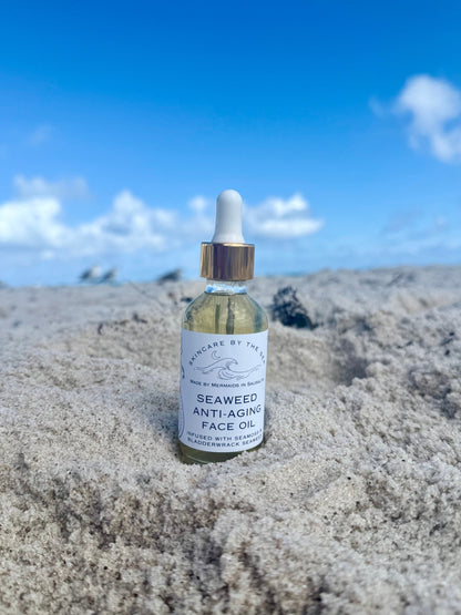 Face oil on a beach with sand and sky background